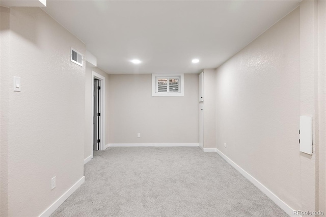 basement with light carpet