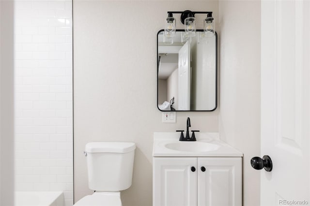 bathroom featuring vanity and toilet