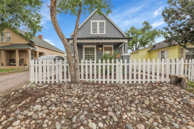 2803 N Cascade Ave, Colorado Springs, CO 80907 - view of front of home featuring a fenced front yard and covered porch