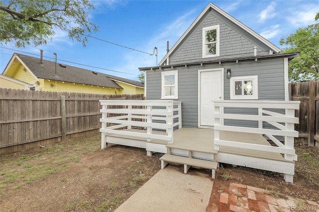 2803 N Cascade Ave, Colorado Springs, CO 80907 - rear view of house featuring a fenced backyard and a wooden deck