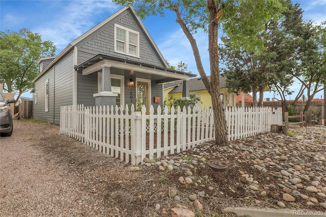 2803 N Cascade Ave, Colorado Springs, CO 80907 - view of front of home with covered porch and a fenced front yard