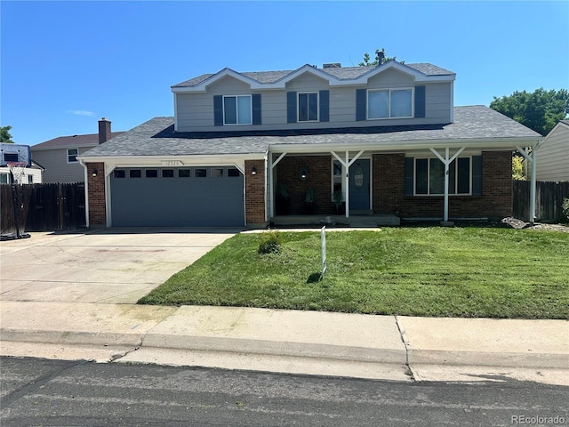 12528 Ash St, Thornton, CO 80241 - traditional home featuring covered porch, concrete driveway, brick siding, and a shingled roof