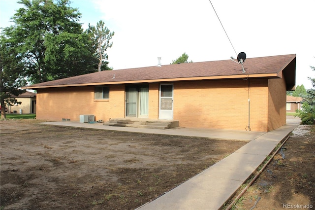 rear view of house with a patio