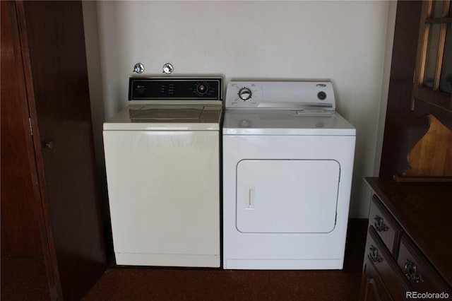 laundry room featuring separate washer and dryer