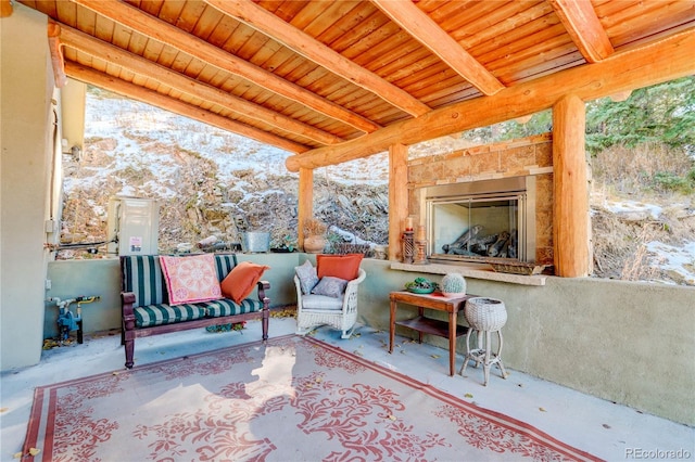 view of patio / terrace featuring an outdoor living space with a fireplace