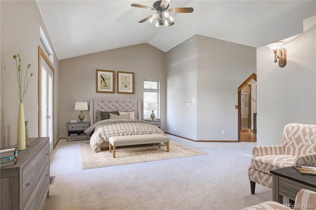 carpeted bedroom featuring vaulted ceiling and ceiling fan