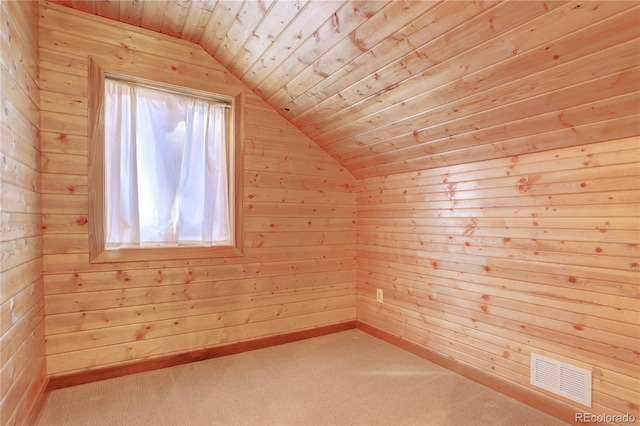 bonus room with wooden walls, vaulted ceiling, carpet flooring, and wooden ceiling