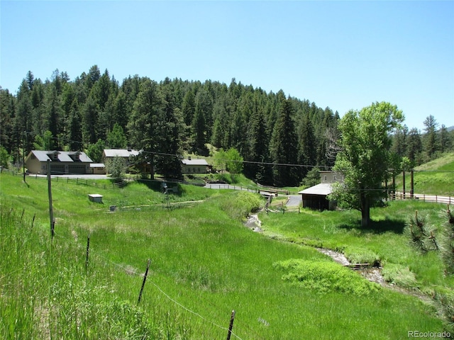 surrounding community featuring a rural view