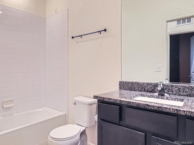 full bathroom with vanity, bathing tub / shower combination, and toilet