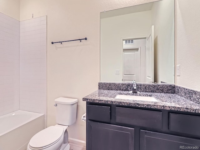 full bathroom featuring vanity, shower / bath combination, and toilet