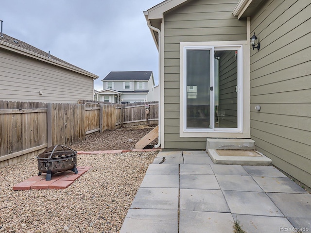 view of patio with a fire pit