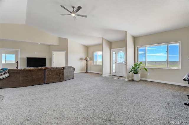 living room with carpet floors, lofted ceiling, and ceiling fan