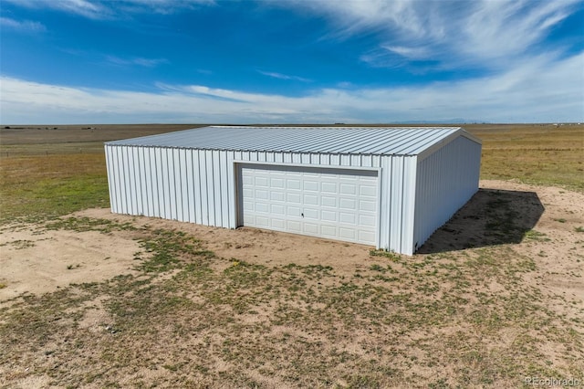 garage with a rural view