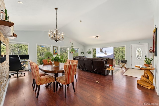 11398 Ranch Elsie Rd, Golden, CO 80403 - dining space featuring dark wood finished floors, lofted ceiling, and a notable chandelier