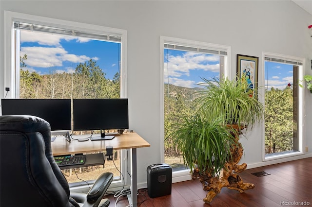 11398 Ranch Elsie Rd, Golden, CO 80403 - home office with hardwood / wood-style flooring, a healthy amount of sunlight, and visible vents