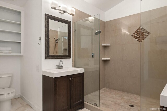 11398 Ranch Elsie Rd, Golden, CO 80403 - full bathroom with walk in shower, toilet, and vanity