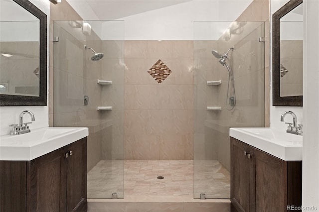 11398 Ranch Elsie Rd, Golden, CO 80403 - full bathroom featuring a shower stall, two vanities, and a sink