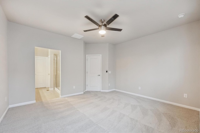9269 Garnett St Unit C, Arvada, CO 80007 - unfurnished bedroom featuring light carpet, baseboards, and ensuite bath