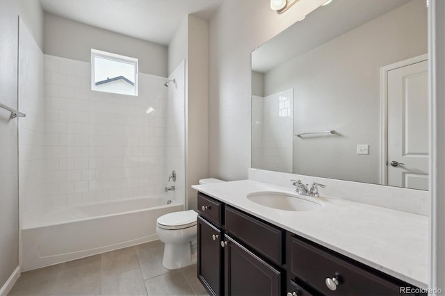 9269 Garnett St Unit C, Arvada, CO 80007 - full bath featuring toilet, vanity, bathing tub / shower combination, and tile patterned floors