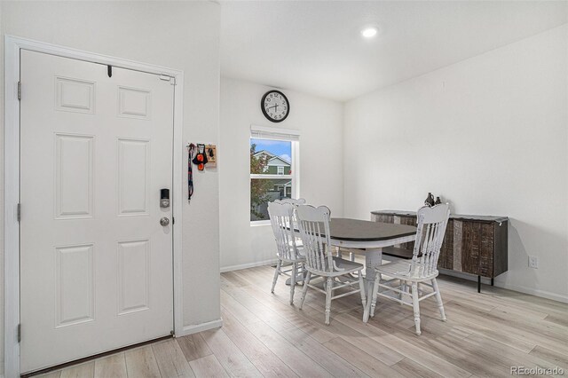 dining room featuring light hardwood / wood-style floors