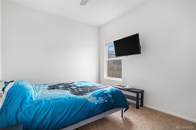 carpeted bedroom featuring ceiling fan