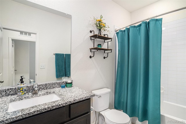 full bathroom featuring toilet, vanity, and shower / bathtub combination with curtain