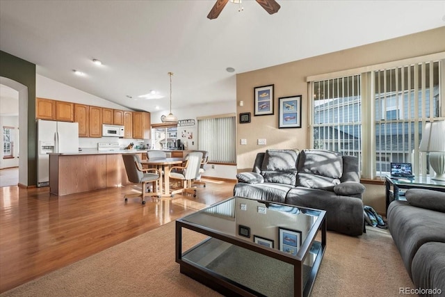 1434 Hickory Dr, Erie, CO 80516 - living room featuring ceiling fan, lofted ceiling, and light hardwood / wood-style flooring