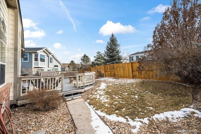 1434 Hickory Dr, Erie, CO 80516 - yard covered in snow featuring a deck