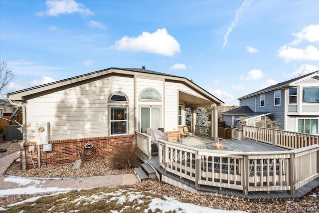 1434 Hickory Dr, Erie, CO 80516 - snow covered property with a deck