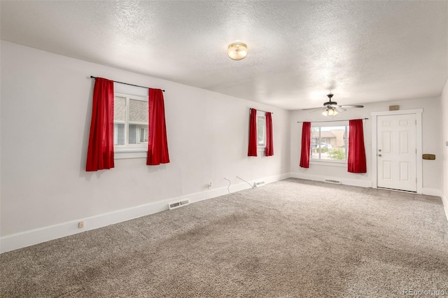 436 S 4th Ave, Brighton, CO 80601 - carpeted spare room with a textured ceiling and ceiling fan