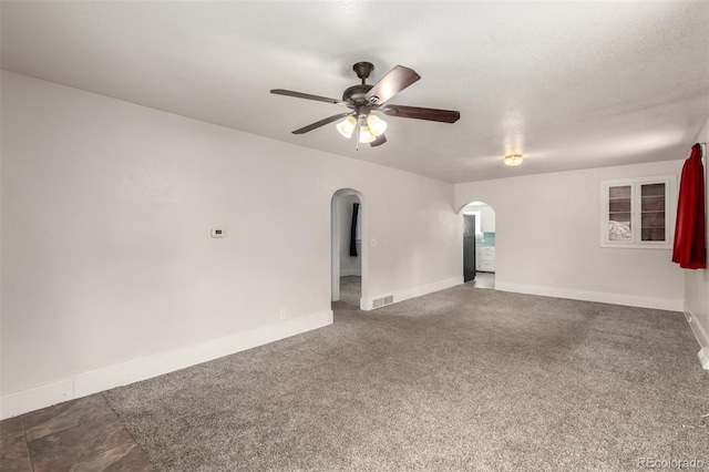 436 S 4th Ave, Brighton, CO 80601 - carpeted spare room with arched walkways and ceiling fan