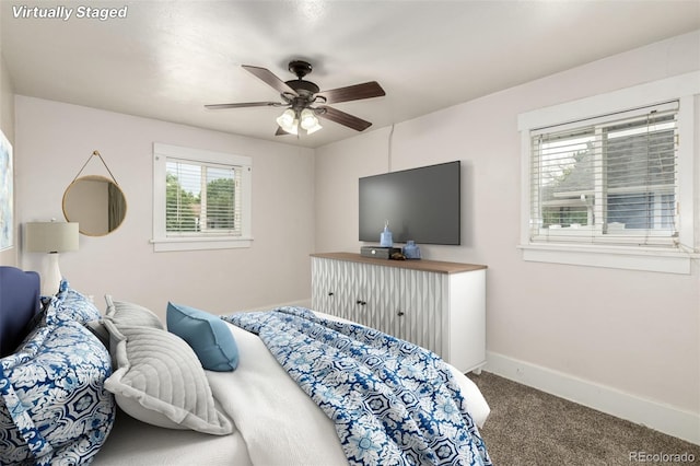 436 S 4th Ave, Brighton, CO 80601 - carpeted bedroom featuring baseboards and a ceiling fan