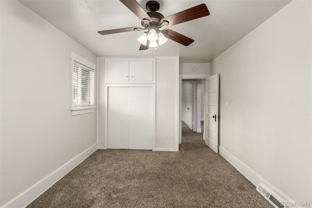436 S 4th Ave, Brighton, CO 80601 - unfurnished bedroom with carpet, a closet, and a ceiling fan