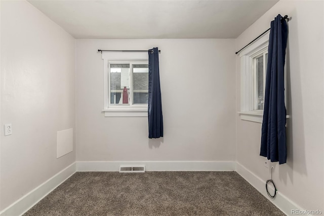 436 S 4th Ave, Brighton, CO 80601 - carpeted empty room with baseboards