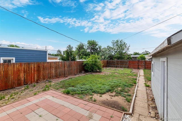 436 S 4th Ave, Brighton, CO 80601 - fenced backyard featuring a patio area