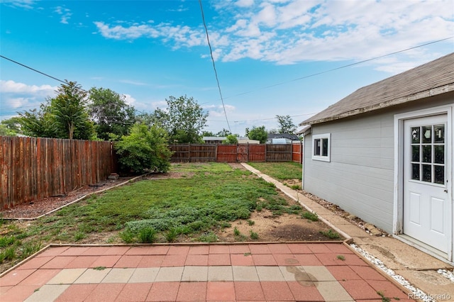436 S 4th Ave, Brighton, CO 80601 - fenced backyard with a patio