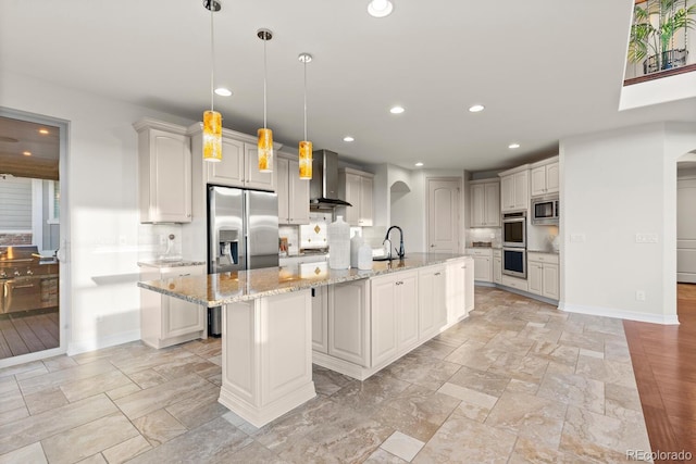771 Braesheather Pl, Highlands Ranch, CO 80126 - kitchen featuring recessed lighting, wall chimney exhaust hood, backsplash, arched walkways, and appliances with stainless steel finishes