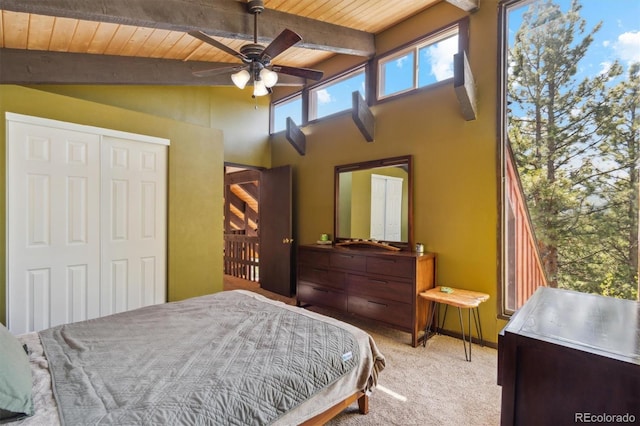 1278 Aspen Dr, Evergreen, CO 80439 - carpeted bedroom featuring wood ceiling, a closet, and ceiling fan