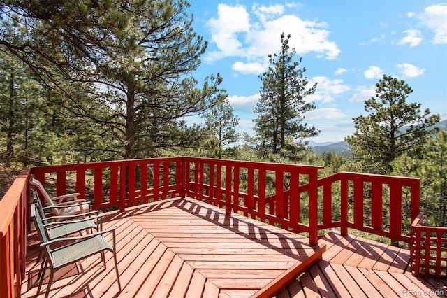 1278 Aspen Dr, Evergreen, CO 80439 - wooden deck with a mountain view