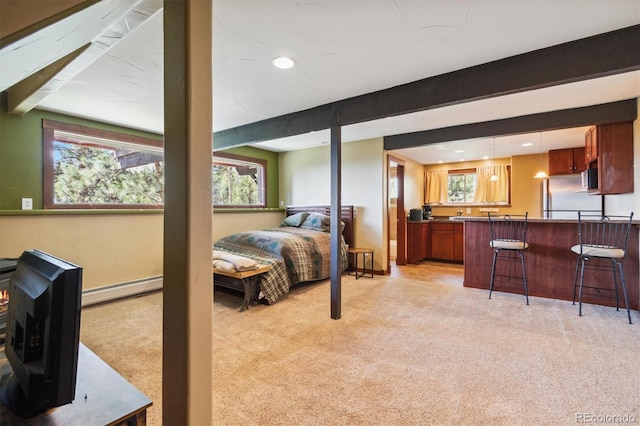 1278 Aspen Dr, Evergreen, CO 80439 - bedroom featuring light colored carpet, fridge, recessed lighting, and a baseboard heating unit