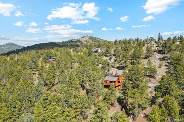 1278 Aspen Dr, Evergreen, CO 80439 - view of subject property featuring a forest and mountains