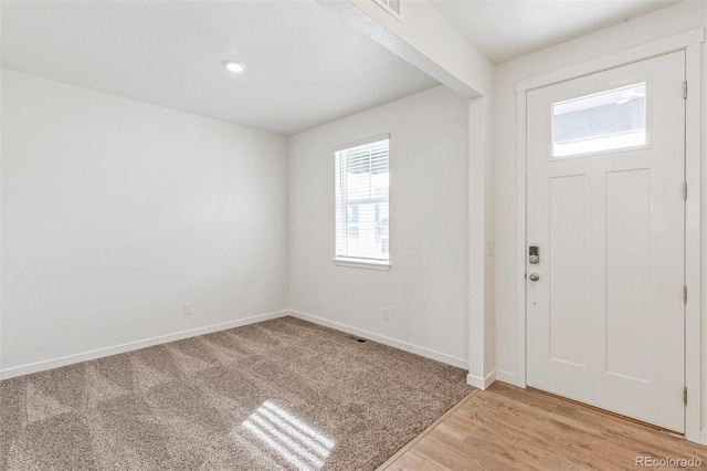 14269 Beebalm Ave, Parker, CO 80134 - foyer featuring baseboards and light wood-type flooring