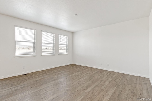 14269 Beebalm Ave, Parker, CO 80134 - spare room with light wood-type flooring and baseboards