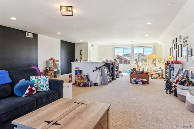 rec room with carpet flooring, visible vents, and recessed lighting