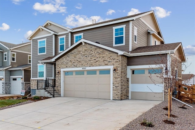 craftsman house with a garage