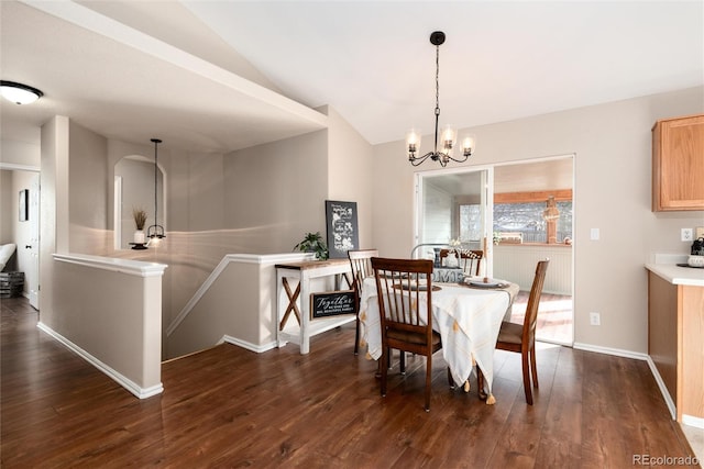 dining area featuring an inviting chandelier, lofted ceiling, baseboards, and dark wood-style flooring