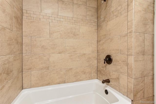 full bath featuring tub / shower combination