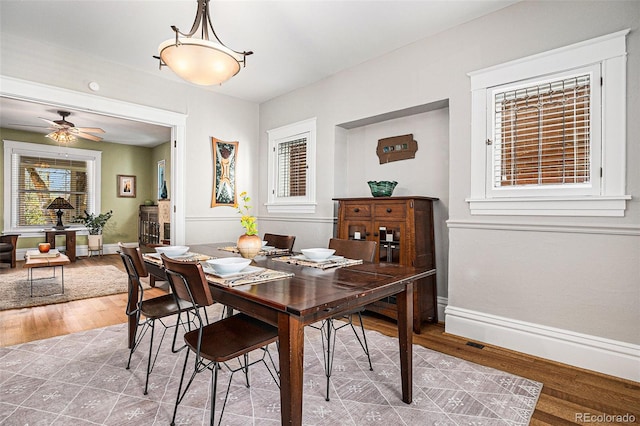 1419 N Adams St, Denver, CO 80206 - dining room with wood finished floors, baseboards, and a ceiling fan