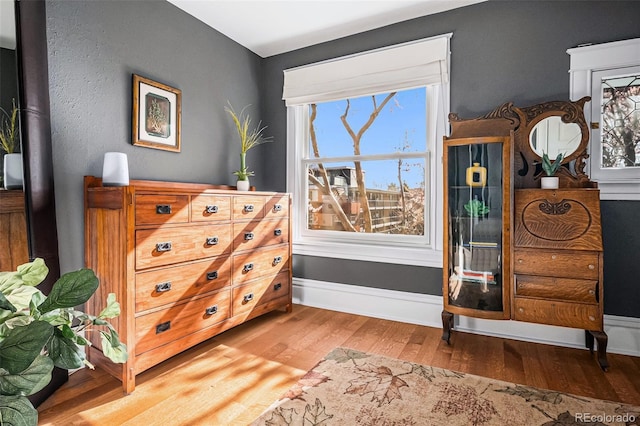 1419 N Adams St, Denver, CO 80206 - sitting room with wood finished floors and baseboards