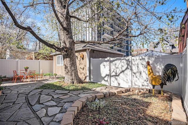 1419 N Adams St, Denver, CO 80206 - view of side of home featuring a fenced backyard and a patio area